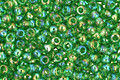 TOHO Transparent Rainbow Peridot Round 11/0 Seed Bead