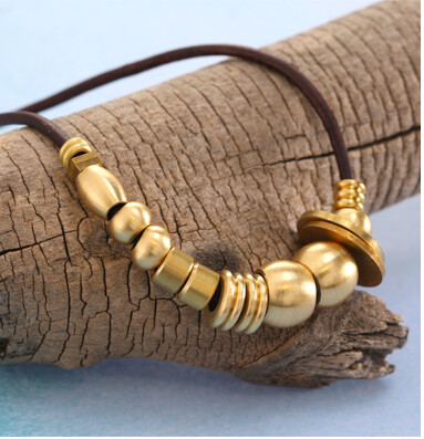 Solid brass beads and cord ends