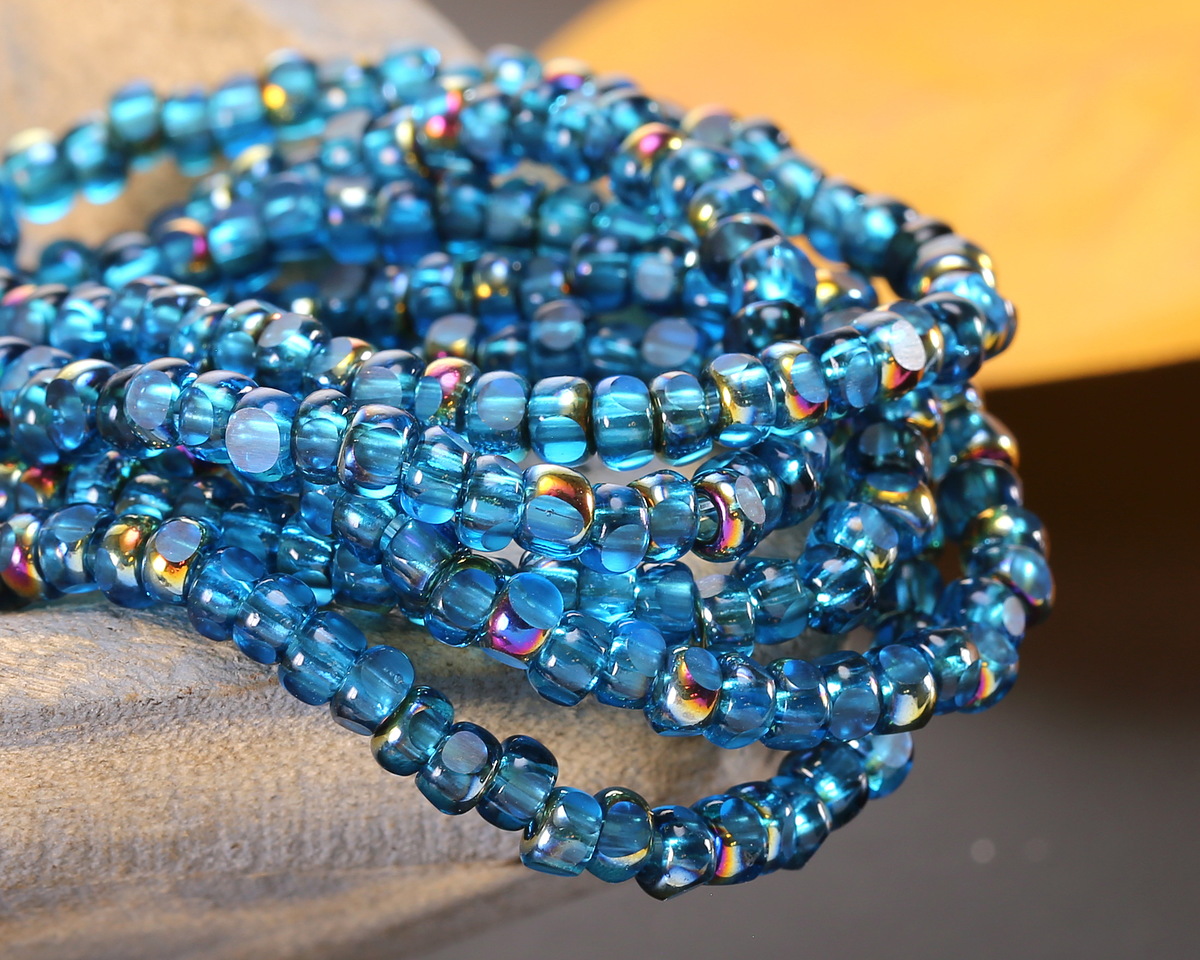 Czech Glass Capri Blue w/ Metallic Rainbow Trica Beads 3x4mm