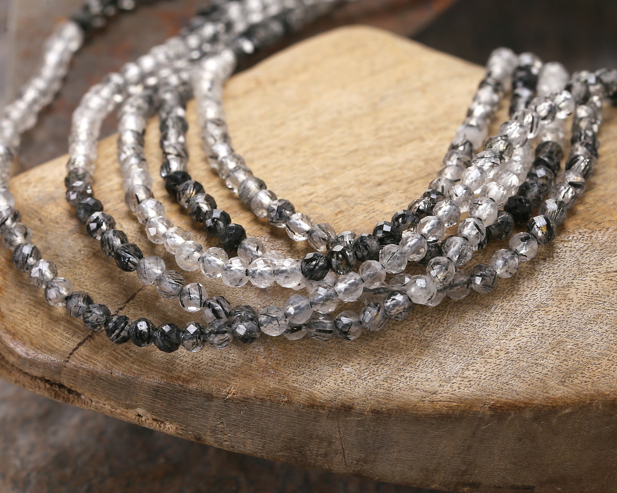 Tourmalinated Quartz (A) Ombré Micrfaceted Round 2mm