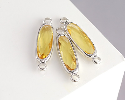 Yellow Crystal Elongated Oval Link in Silver Finish Bezel 22x6mm