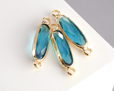 Pacific Blue Crystal Elongated Oval Link in Gold Finish Bezel 22x6mm