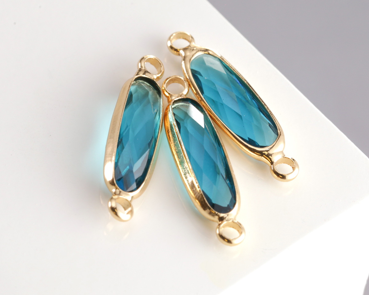 Pacific Blue Crystal Elongated Oval Link in Gold Finish Bezel 22x6mm