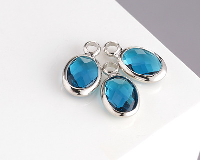 Pacific Blue Crystal Oval Drop in Silver Finish Bezel 6x8mm
