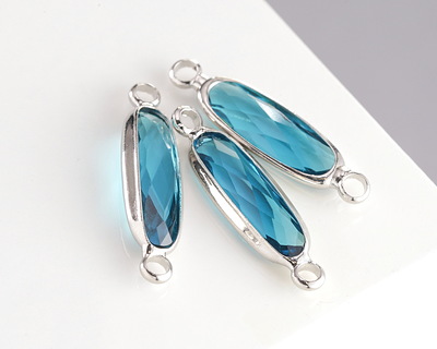 Pacific Blue Crystal Elongated Oval Link in Silver Finish Bezel 22x6mm