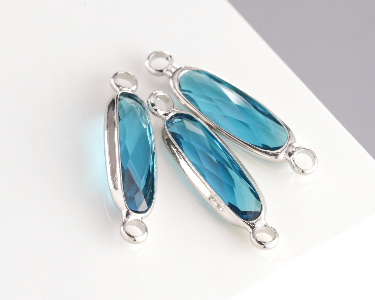 Pacific Blue Crystal Elongated Oval Link in Silver Finish Bezel 22x6mm