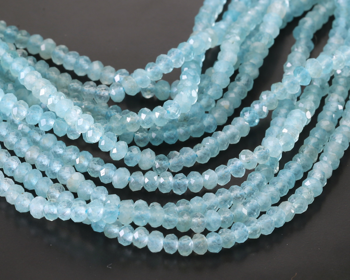 thumbnail image 2 of Brazilian Aquamarine Rondelle Beads – 2x4mm Faceted Abacus Shape – Light Blue – 15 Pieces 2 of 5