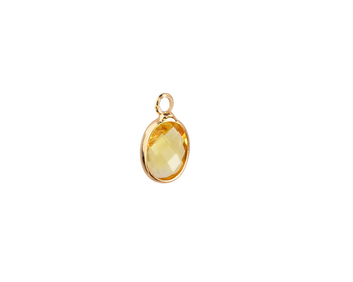 Yellow Crystal Oval Drop in Gold Finish Bezel 6x8mm